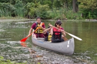 Students canoeing on campus